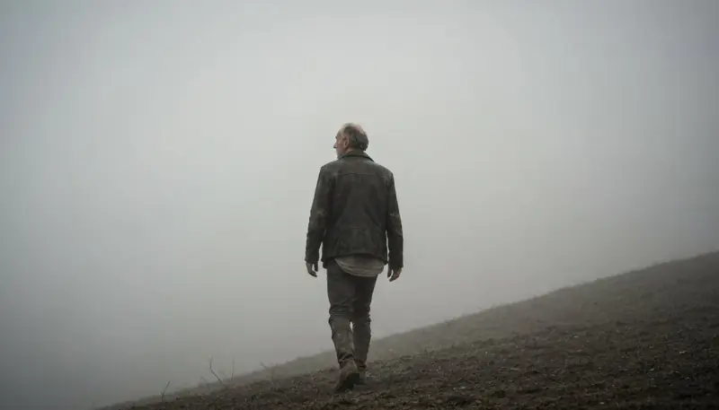 A lone figure walking through heavy fog, the disorientation of the NoFap flatline