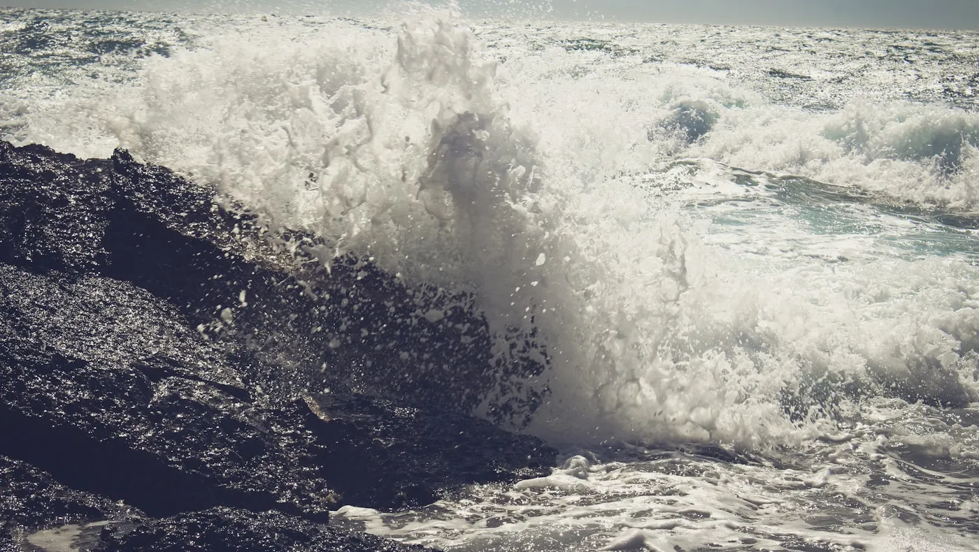 A wave breaking and rolling over itself