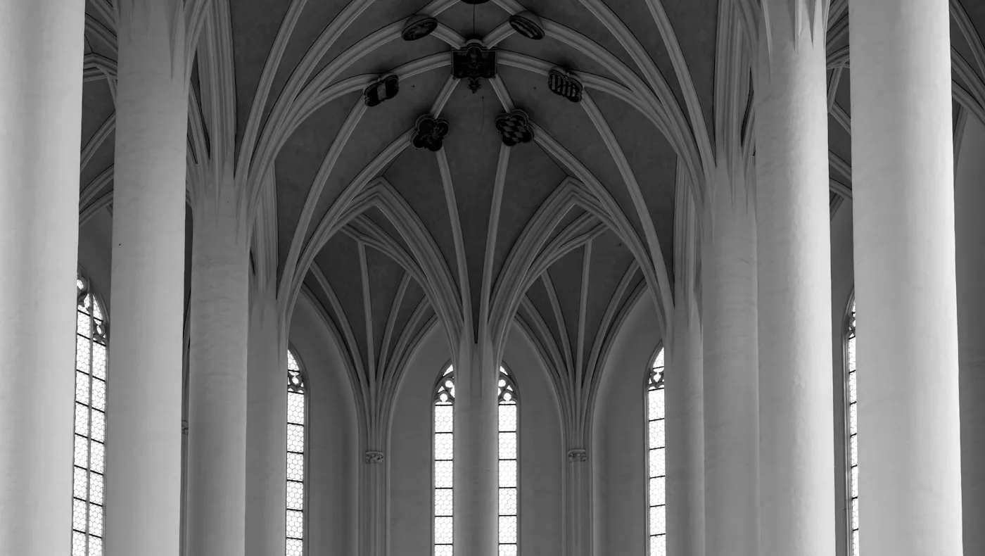 Tall stone columns in a quiet hall