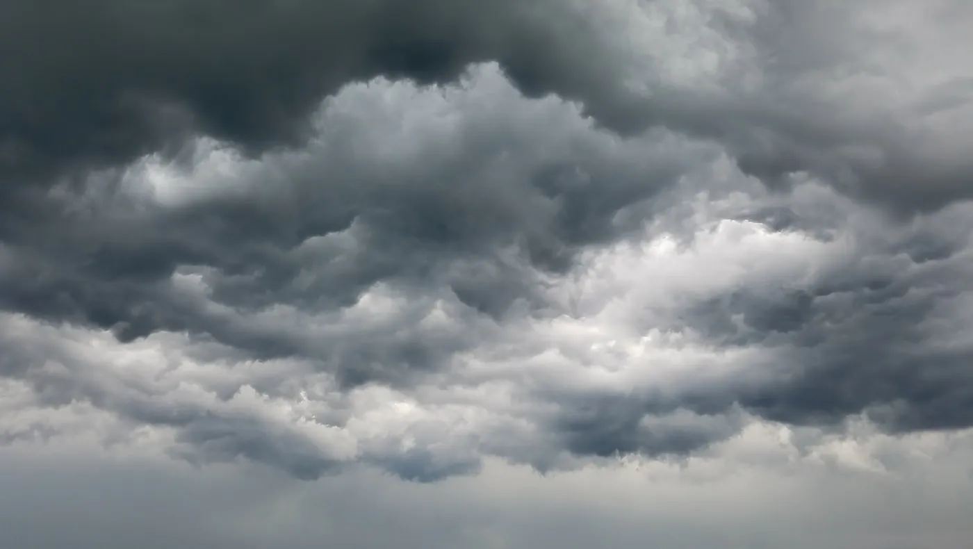 Heavy storm clouds starting to break apart
