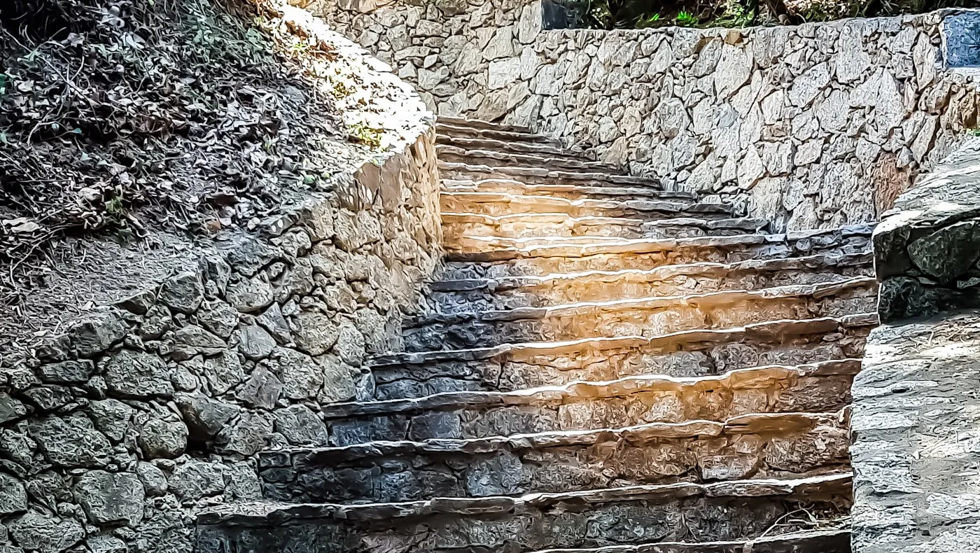 Stone steps climbing upward in the light